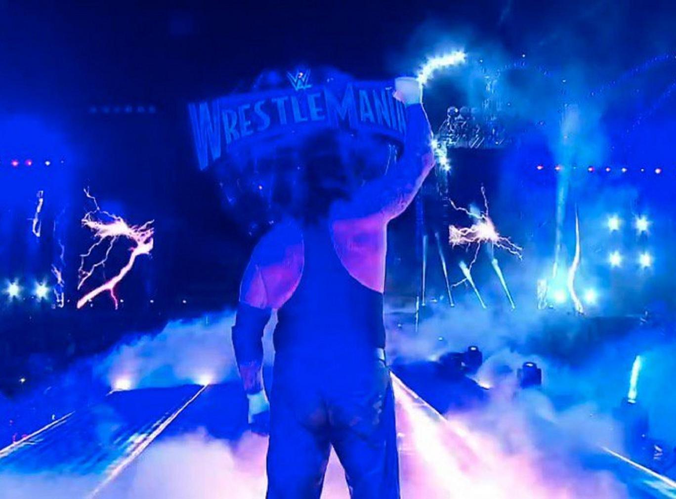 WrestleMania 33 results: The Undertaker breaks character, hugs his wife then retires after Roman Reigns defeat